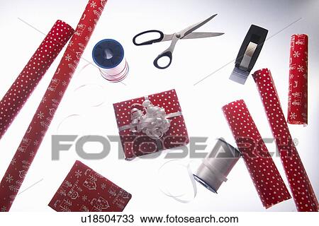 Stock Image - Christmas wrapping paper and ribbon. Fotosearch