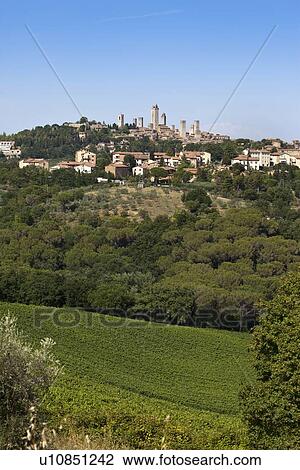 City on hillside in rural landscape View Large Photo Image Stock Image - City on hillside in rural landscape. Fotosearch