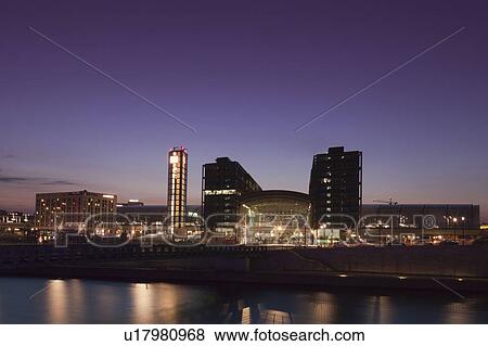 City skyline lit up at night View Large Photo Image Stock Photo - City skyline lit up at night. Fotosearch