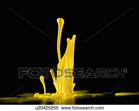 Stock Photography - Close up of drop of paint splashing. Fotosearch