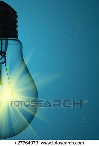 Stock Photo - Close up of glowing light bulb. Fotosearch