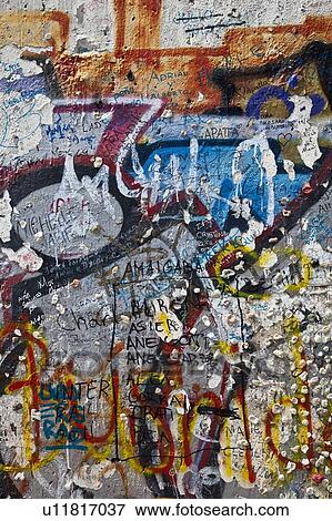 Close up of graffiti on Berlin Wall View Large Photo Image Stock Photo - Close up of graffiti on Berlin Wall. Fotosearch
