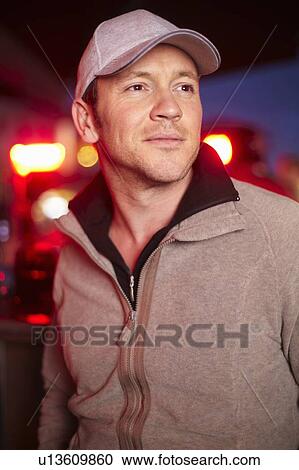 Stock Image - Close up of mans smiling face. Fotosearch