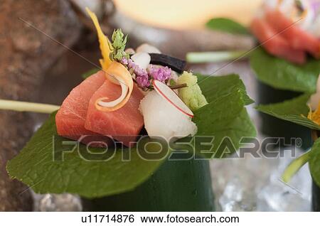 Close up of ornate piece of sushi View Large Photo Image Stock Photograph - Close up of ornate piece of sushi. Fotosearch