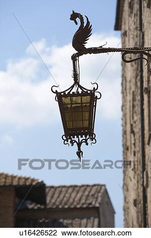 Stock Image - Close up of ornate streetlight. Fotosearch