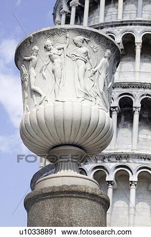 Stock Image - Close up of relief carvings on statue. Fotosearch