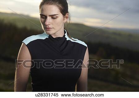 Close up of runner standing outdoors View Large Photo Image Stock Photography - Close up of runner standing outdoors. Fotosearch