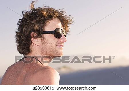 Close up of smiling man in sunglasses View Large Photo Image Stock Photography - Close up of smiling man in sunglasses. Fotosearch