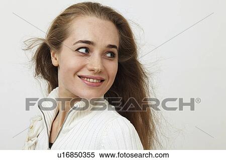 Stock Photography - Close up of smiling womans face. Fotosearch