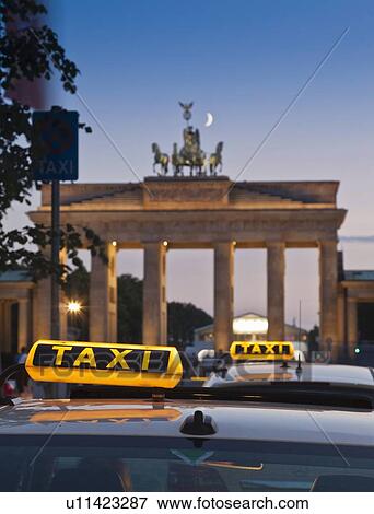 Close up of taxi signs on cabs View Large Photo Image Stock Photo - Close up of taxi signs on cabs. Fotosearch