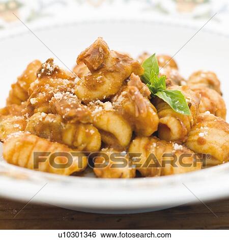 Close up of traditional Carloforte pasta View Large Photo Image Stock Photograph - Close up of traditional Carloforte pasta. Fotosearch