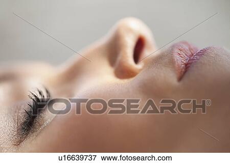 Close up of womans face View Large Photo Image Stock Photo - Close up of womans face. Fotosearch
