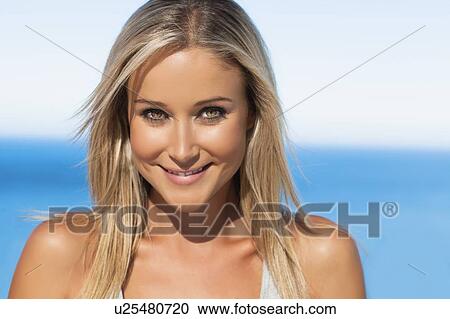 Close up of womans smiling face View Large Photo Image Stock Image - Close up of womans smiling face. Fotosearch