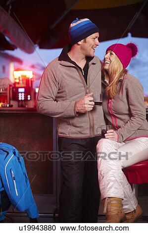Couple having coffee together at cafe View Large Photo Image Stock Image - Couple having coffee together at cafe. Fotosearch
