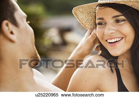 Couple laughing on beach View Large Photo Image Stock Photography - Couple laughing on beach. Fotosearch
