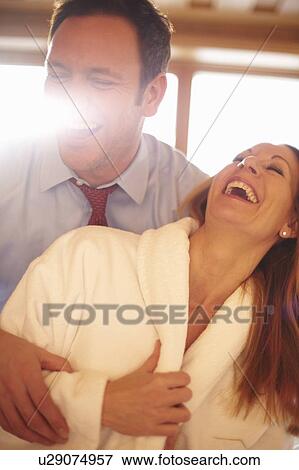 Couple laughing together View Large Photo Image Stock Photo - Couple laughing together. Fotosearch