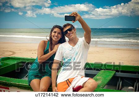 Couple taking picture of themselves View Large Photo Image Stock Image - Couple taking picture of themselves. Fotosearch