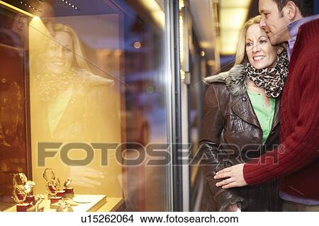 Picture - Couple window shopping together. Fotosearch