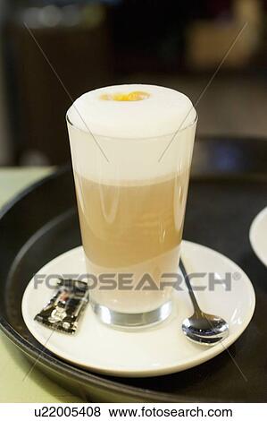 Cup of coffee on serving tray View Large Photo Image Stock Photo - Cup of coffee on serving tray. Fotosearch