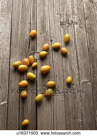 Fruit scattered on wooden table View Large Photo Image Stock Image - Fruit scattered on wooden table. Fotosearch