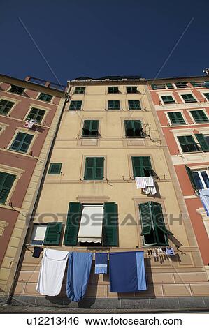 Stock Photograph - Low angle view of apartment buildings. Fotosearch