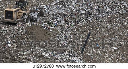 Machinery at garbage collection center View Large Photo Image Stock Image - Machinery at garbage collection center. Fotosearch