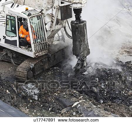 Machinery at garbage collection center View Large Photo Image Stock Image - Machinery at garbage collection center. Fotosearch