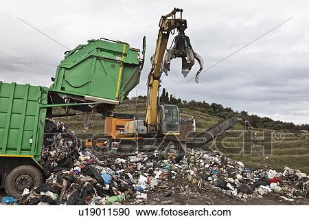 Stock Image - Machinery at garbage collection center. Fotosearch