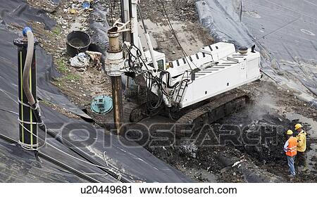 Stock Image - Machinery at garbage collection center. Fotosearch