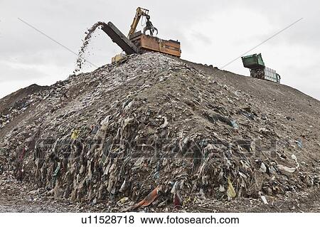 Machinery at garbage collection center View Large Photo Image Stock Photo - Machinery at garbage collection center. Fotosearch