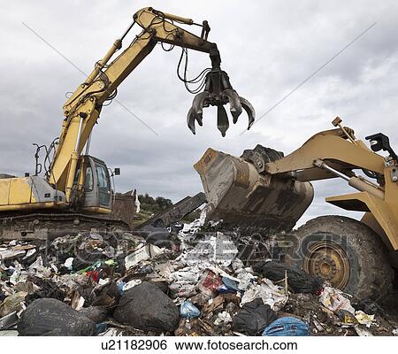 Machinery at garbage collection center View Large Photo Image Stock Photograph - Machinery at garbage collection center. Fotosearch