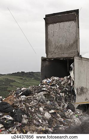 Stock Photograph - Machinery at garbage collection center. Fotosearch