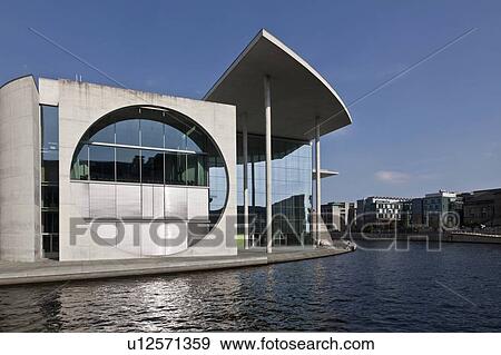 Stock Photo - Modern building on urban canal. Fotosearch