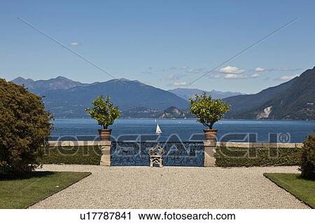 Stock Image - Ornate gate by waterfront. Fotosearch