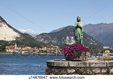 Stock Photo - Ornate statue on waterfront wall. Fotosearch