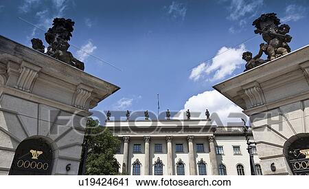 Stock Image - Ornate statues in courtyard. Fotosearch