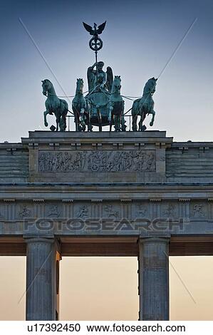 Ornate statues on columned building View Large Photo Image Stock Image - Ornate statues on columned building. Fotosearch