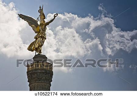 Ornate tower against blue sky View Large Photo Image Picture - Ornate tower against blue sky. Fotosearch