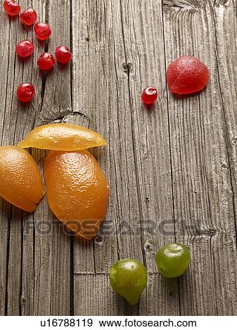 Stock Photo - Peeled fruit on wooden table. Fotosearch