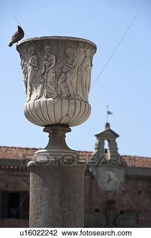 Pigeon perched on ornate statue View Large Photo Image Stock Image - Pigeon perched on ornate statue. Fotosearch