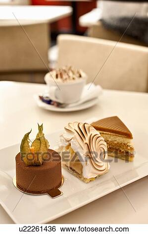 Plate of ornate desserts in restaurant View Large Photo Image Stock Photograph - Plate of ornate desserts in restaurant. Fotosearch