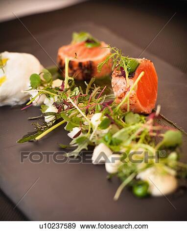 Plate of seared salmon and salad View Large Photo Image Stock Photo - Plate of seared salmon and salad. Fotosearch