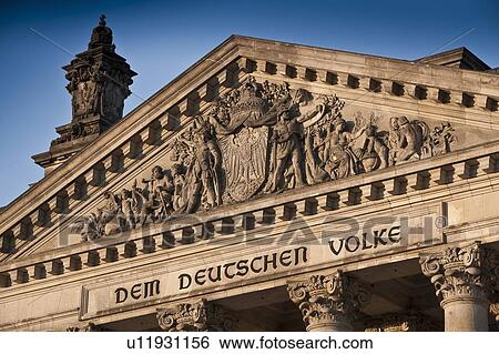 Stock Photograph - Relief carvings on columned building. Fotosearch