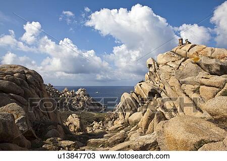 Stock Image - Rock formations on coastline. Fotosearch