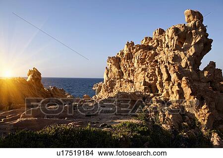 Picture - Rock formations on rural coastline. Fotosearch