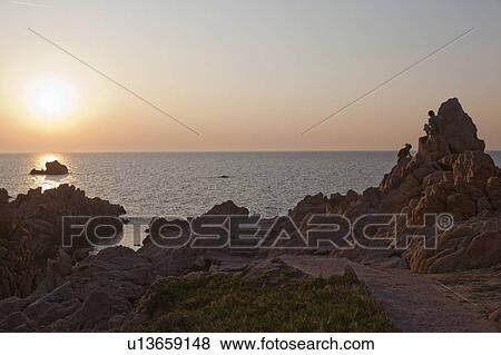 Rock formations on rural coastline View Large Photo Image Stock Photo - Rock formations on rural coastline. Fotosearch