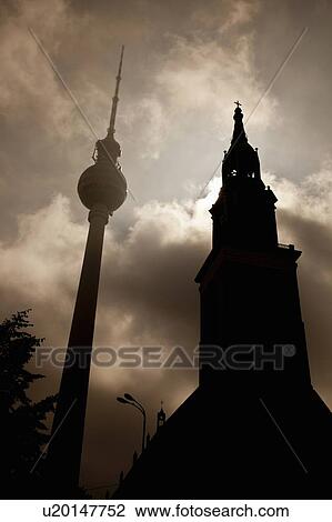 Stock Image - Silhouette of clock towers. Fotosearch
