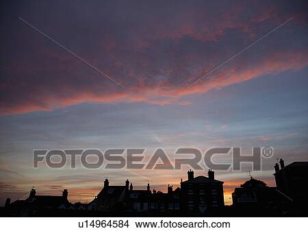Silhouette of houses at sunset View Large Photo Image Picture - Silhouette of houses at sunset. Fotosearch
