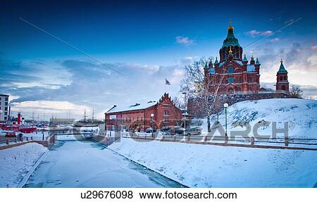 Snow-covered castle by frozen river View Large Photo Image Stock Photo - Snow-covered castle by frozen river. Fotosearch