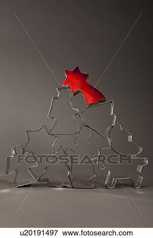 Stack of decorative cookie cutters View Large Photo Image Stock Photo - Stack of decorative cookie cutters. Fotosearch